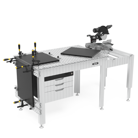 Siegmund aluminum workbench with miter saw on a side extension, drawer cabinet, and clamps holding flat plates
