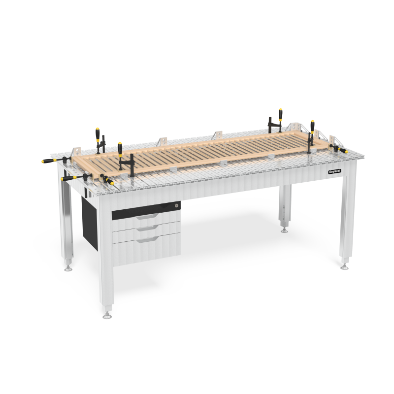 Load image into Gallery viewer, Siegmund aluminum workbench with a wood slat panel clamped on the 16 mm grid, drawer cabinet underneath and side clamps
