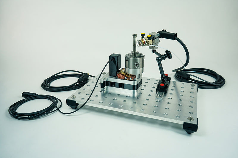 Load image into Gallery viewer, Orbital Service TURN Series compact welding turn table on perforated aluminum base plate with torch holder and integrated cabling
