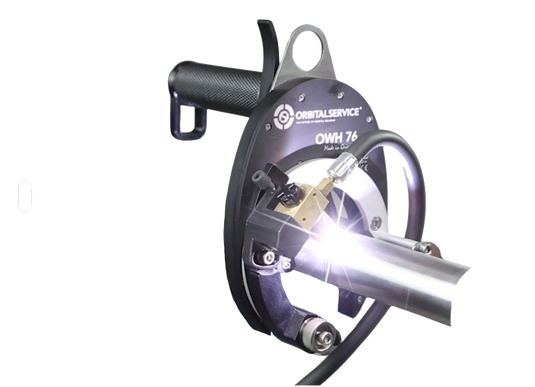 Orbital Service OWH 76 Open Weld Head performing orbital TIG weld on stainless steel pipe with bright arc